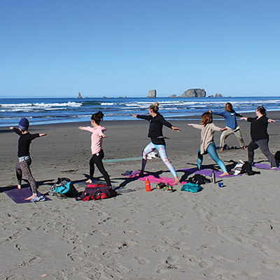 people doing yoga on the beach Olympic Coast NMS; Karlyn Langjahr/NOAA;