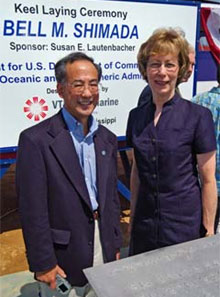 NOAA image of Susan Lautenbacher, sponsor of BELL M. SHIMADA, posing with Allen Shimada, a scientist with NOAA Fisheries Service, who is the son of the ship's namesake.