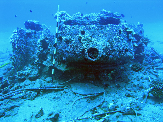 The short 75mm barrel denotes an LVT(A)-4.  This site is essentially a turret and engine amidst debris.