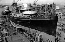 USS Macaw on the launching ways, July 12th 1942, at Moore Drydock Company, Oakland California.