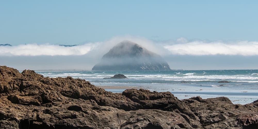 view from the rock shore to morro rock, a volcanic plug