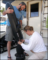 Russ Green and Brenda Altmeier assemble the diver propulsion vehicle