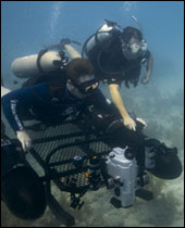 Russ Green and Brenda Altmeier assemble the diver propulsion vehicle