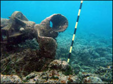 Propeller attached to exposed engine block at Pearl and 
Hermes Atoll, apparently run aground at speed.