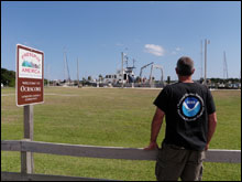 Russ Green observes the R-8501 at Ocracoke Island as it is loaded for the 2010 Battle of the Atlantic expedition (NOAA)