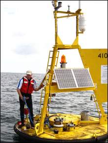 Dr. Scott Noakes replacing pCO2 sensor system on the Grays Reef buoy (photo credit: Sarah Fangman).