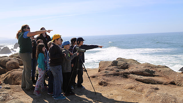 Students take part in Cordell Bank National Marine Sanctuary's ​​Every Kid in a Park activities​, overlooking​ ​Greater Farallones National Marine Sanctuary, close to Point Reyes National Seashore