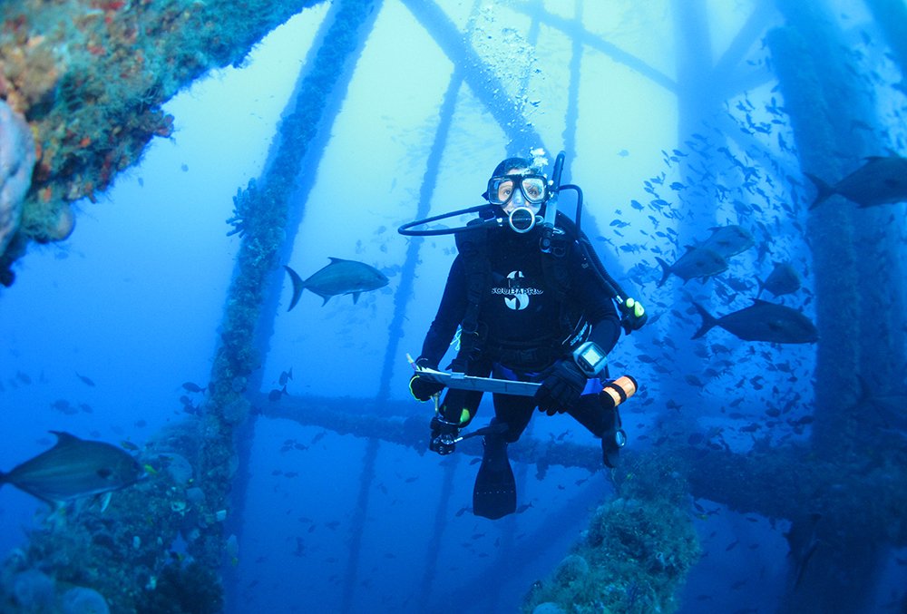 Dr. Michelle Johnston pauses on a research dive in the sanctuary