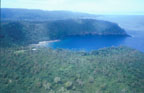 photo of aerial view of Fagatele Bay and surrounding ridge