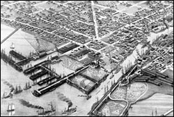 Figure 26 and 27. A bird's-eye view of the city of Alpena in 1880, including lumber docks to the left of the mouth of the Thunder Bay River and log booms to the right of the river. Submerged remnants of this historic waterfront still survive and are part of the area's maritime cultural landscape (Jesse Besser Museum).