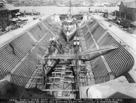 McCulloch in dry-dock with two unnamed submarines at Mare Island Navy Shipyard