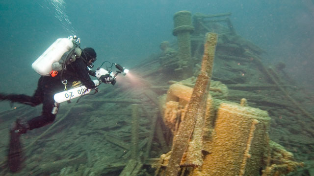 diver and a shipwreck