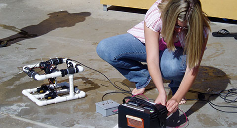 photo of a student building an rov