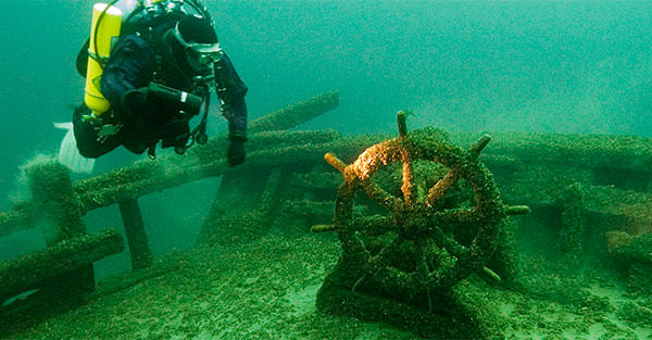 diver and a shipwreck