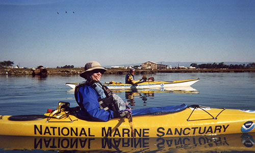 volunteers on kayaks