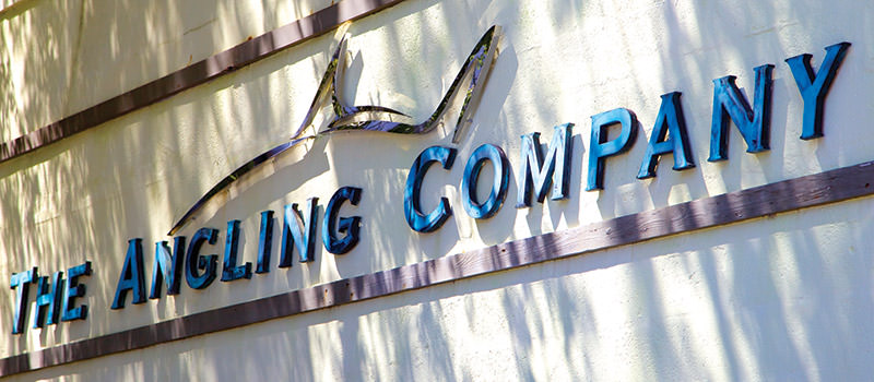 the angling company sign outside the store