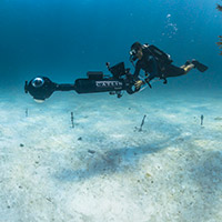 photo of diver and camera