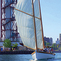 A boat sails off of Dobbin’s Landing in Erie