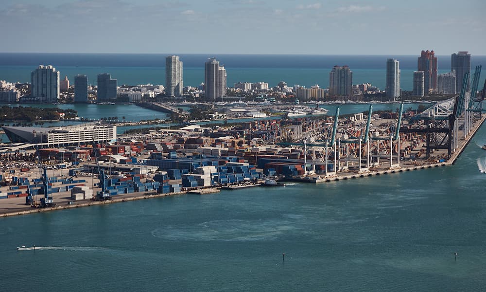 aerial view shows many cargo containers at the port of Miami