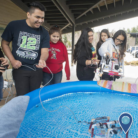 students from the Quileute Tribal School pilot remotely operated vehicles that they built