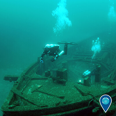 The Rouse Simmons wreck is surveyed by divers. Credit: Tamara Thomsen/Wisconsin Historical Society