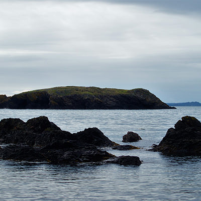 rocky outcroppings extending above the ocean