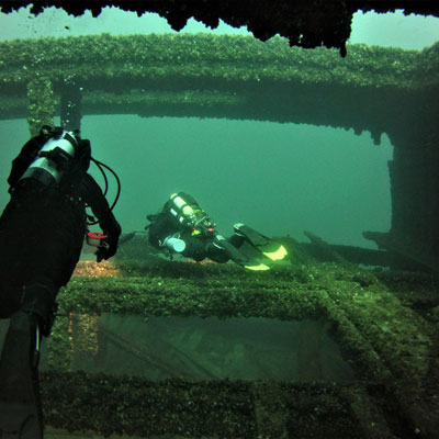 two divers on wreck