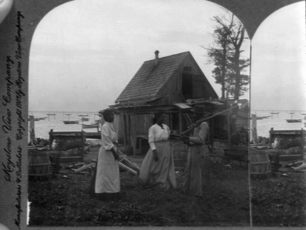 People standing in front of a home