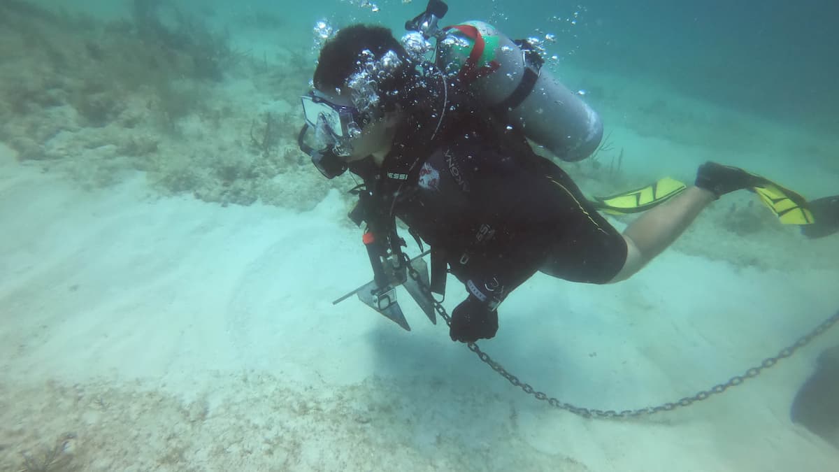 A scuba diver bottom of the ocean