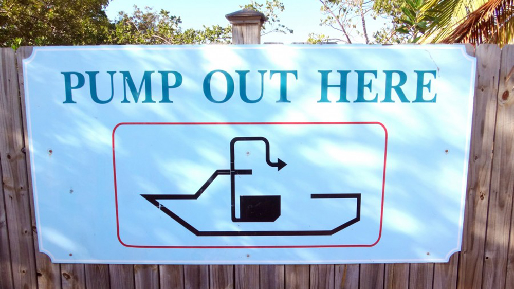 a sign that says pump out here