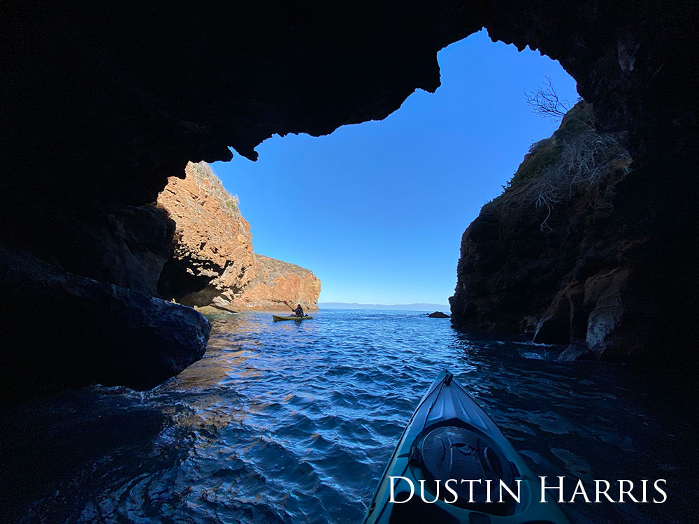 kayaking through a sea cave