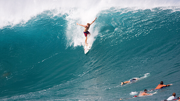 a person surfing a big wave