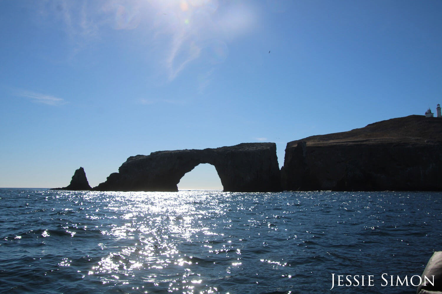 Rock arch in the water.