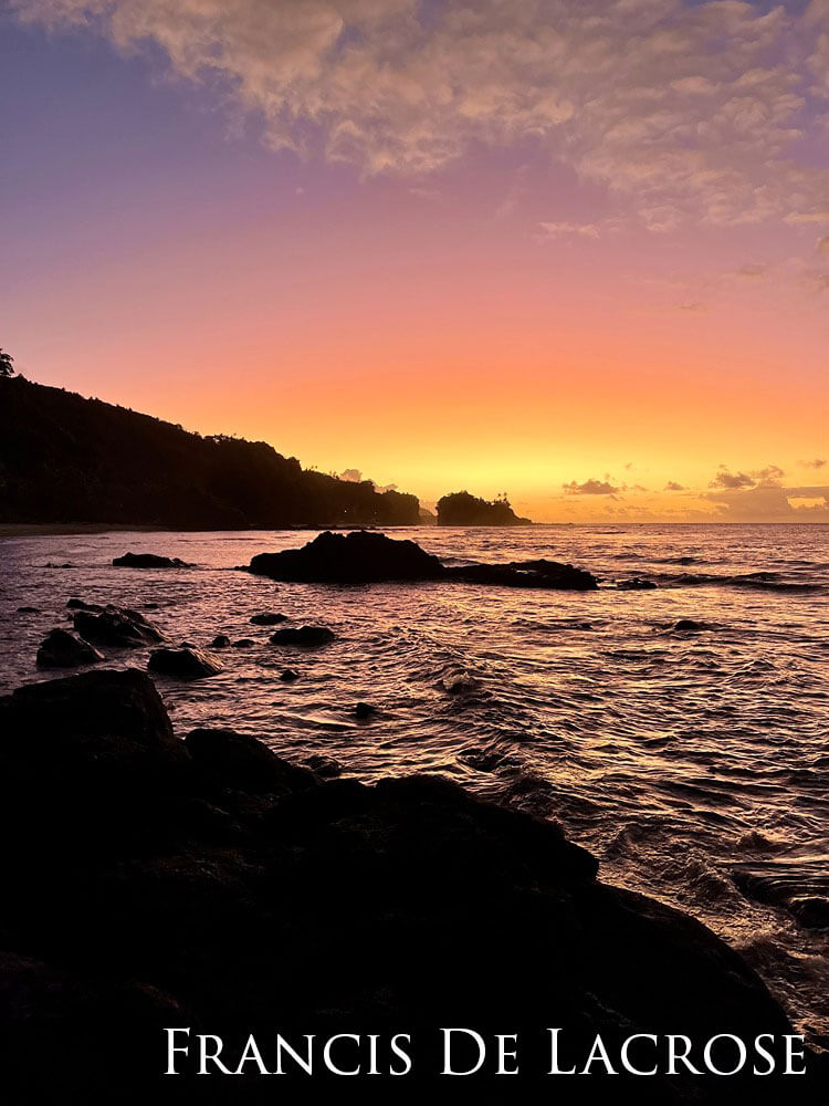 Sunset on a rocky shoreline. 