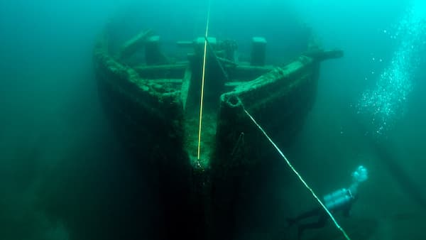 Shipwreck in foggy water