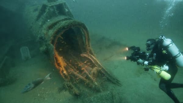 Diver looking at a shipreck