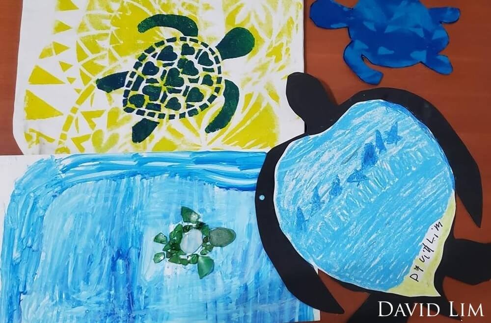 Mosaic sea turtle made from broken glass from beach clean up; sea turtles painted on tote bag;
                                paper and crayon sea turtle; sea turtle cut from elei printed fabric with Samoan design.