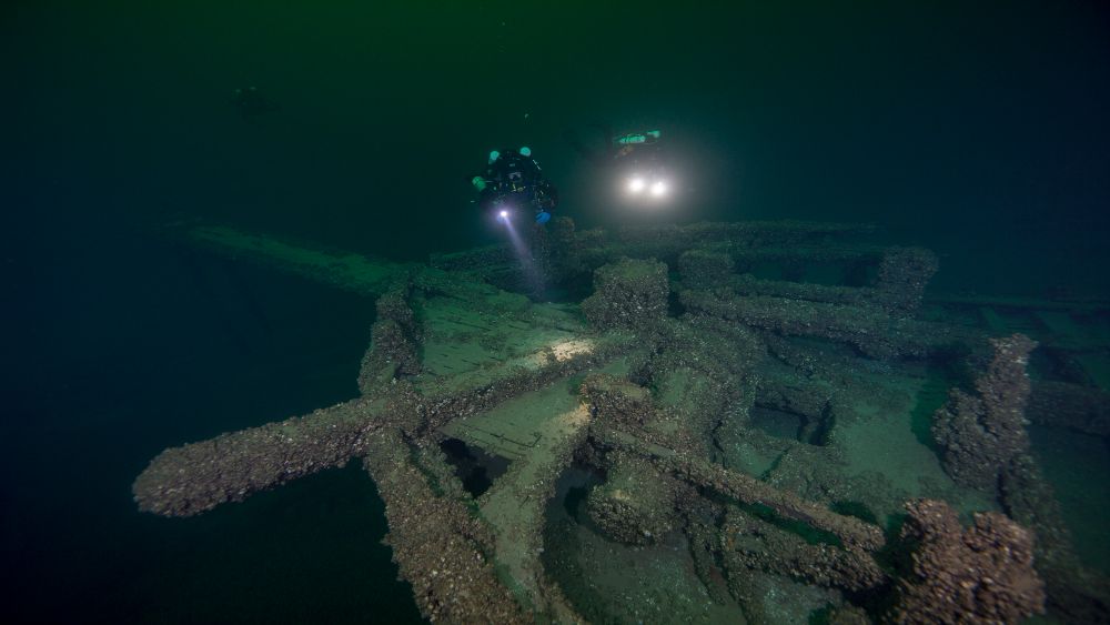Two divers investigate the wreck of the St. Peter