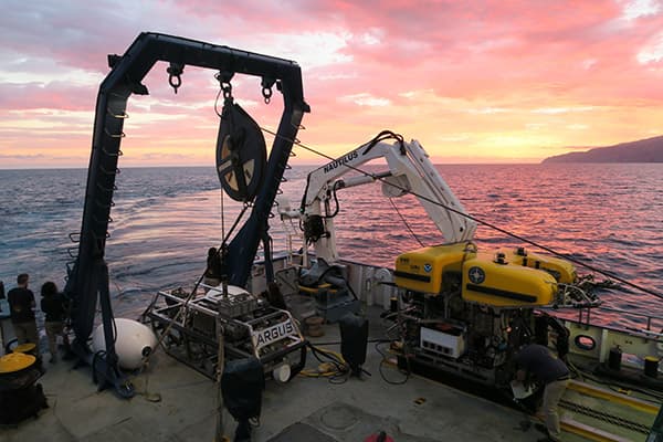 two ROVs on the deck of the Nautilus