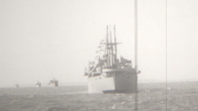 black and white photo of ships at sea