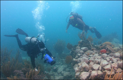 divers document a pile of ballast stones