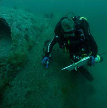 Dave Conlin, National Park Service, collecting corrosion data on the U-352