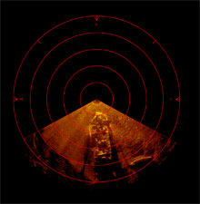 Sector scanning sonar image of the HMT Bedfordshire with the stern toward the center of the image
