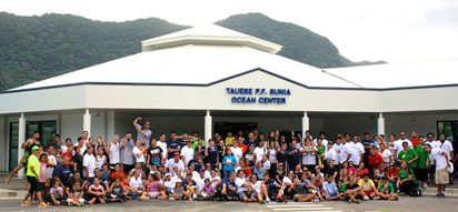 volunteers line up for a group photo at the Healthy People-Healthy Ocean Family Fun Day