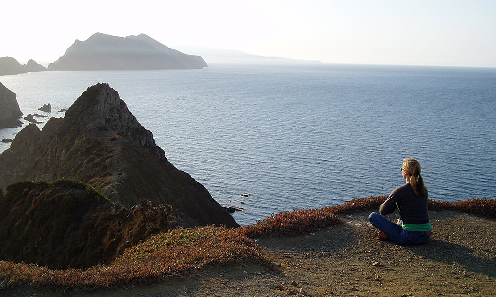 A visitor relaxes on the overlook of both Channel Islands National Marine Sanctuary and Channel Islands National Park