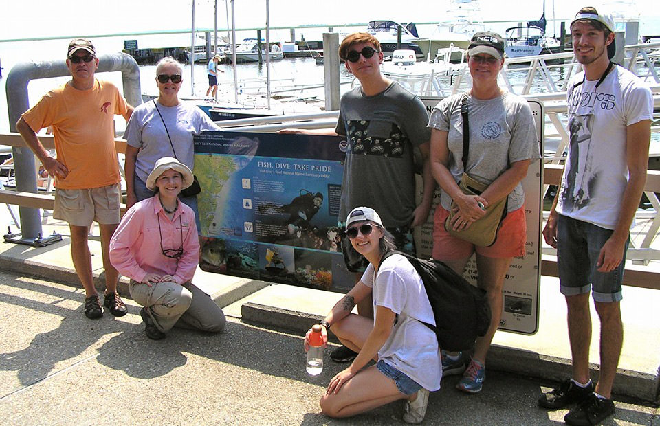 visitors at the boat ramp sign at linding horbor marina