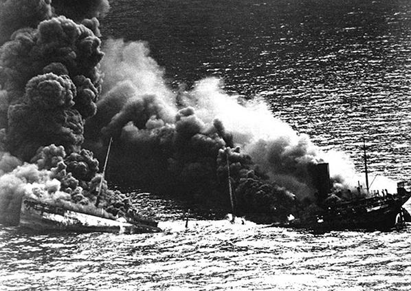 Tanker Dixie Arrow burning following a torpedo attack.