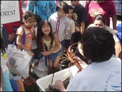 A MERITO bilingual intern shares her knowledge at a recent Oxnard Earth Day event. 