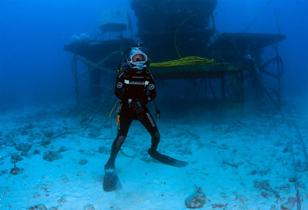 A shot of Fabien Cousteau standing in front of Aquarius