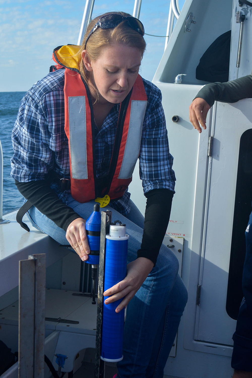 Dr. Jenni Stanley deploys a hydrophone in Gray’s Reef National Marine Sanctuary.